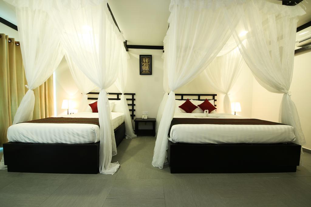 Twin Palms Resort Sihanoukville Rom bilde